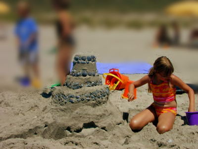 Children might smooth and decorate their castles too